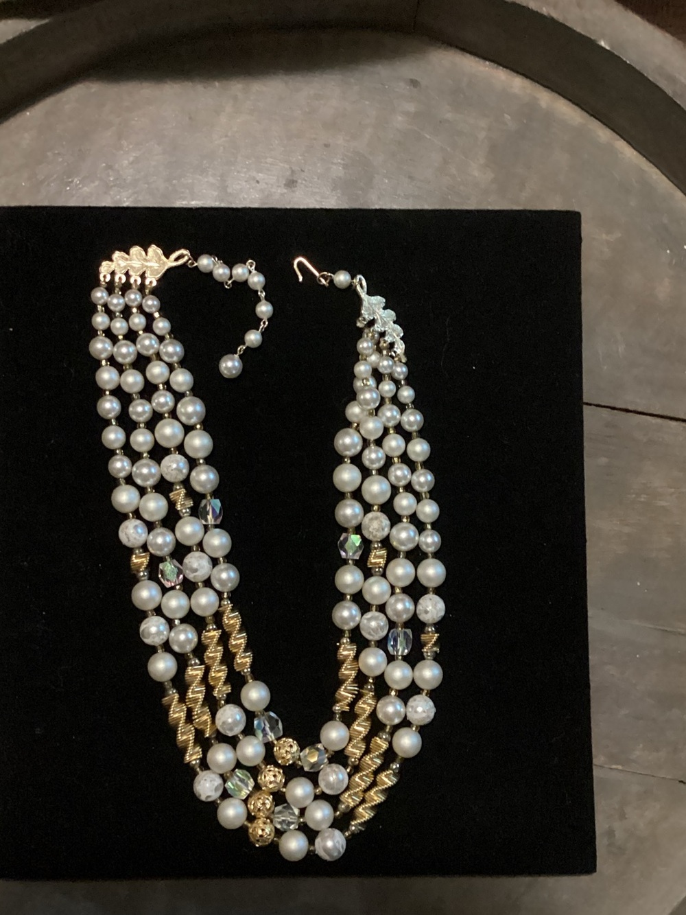 Elegant White Pearl Multi-Strand Necklace with Gold Accents
